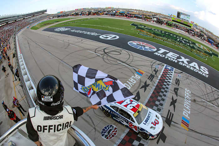 William Byron takes the checkered flag to win Sunday's Autotrader EchoPark Automotive 400 at Texas Motor Speedway. (Photo by Jonathan Bachman/Getty Images)